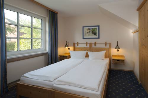 Imagen de la habitación del BEECH Resort Fleesensee. Foto 15