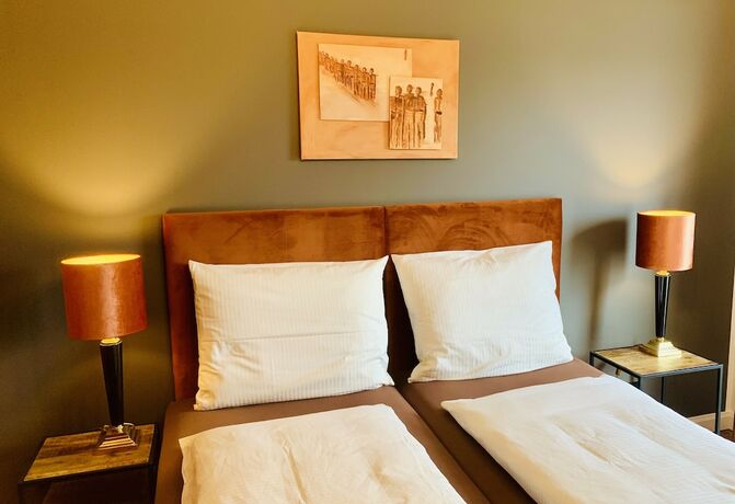 Imagen de la habitación del BESOTEL Mettmann. Foto 14