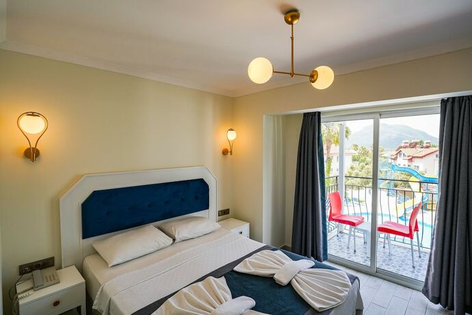 Imagen de la habitación del BLUE PEARL HOTELand VILLAS. Foto 18