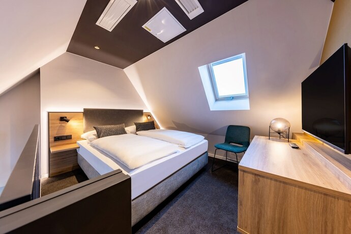 Imagen de la habitación del BOLLWERK Lifestyle Hotel - automatisiertes Hotel mit Self Check In. Foto 12