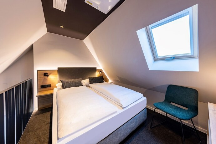 Imagen de la habitación del BOLLWERK Lifestyle Hotel - automatisiertes Hotel mit Self Check In. Foto 19