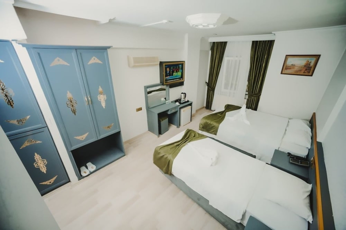 Imagen de la habitación del BURAKGOLD HOTEL. Foto 11