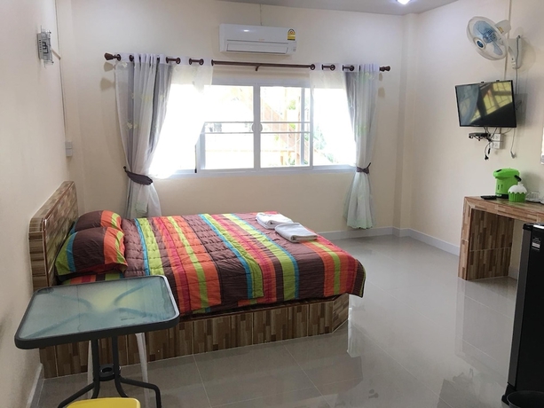 Imagen de la habitación del Baan Suan Palm Resort. Foto 7
