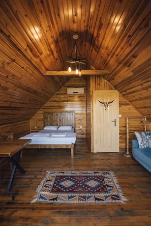 Imagen de la habitación del Babil Bungalow Boutique Hotel. Foto 11