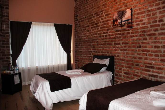 Imagen de la habitación del Babylon Loft Hotel. Foto 2