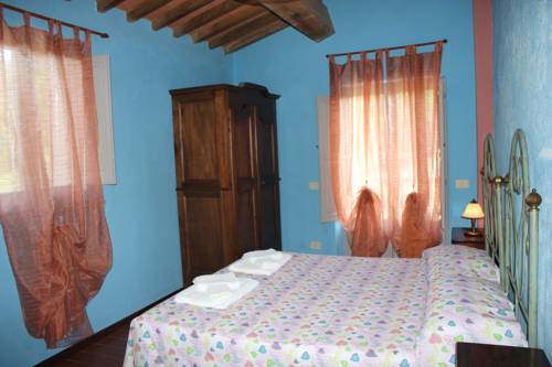 Imagen de la habitación del Badia Il Vingone. Foto 5