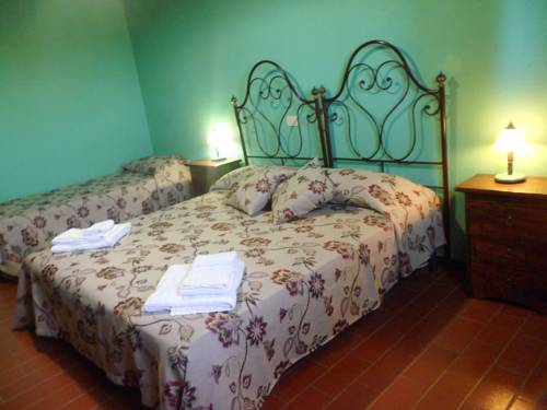 Imagen de la habitación del Badia Il Vingone. Foto 15