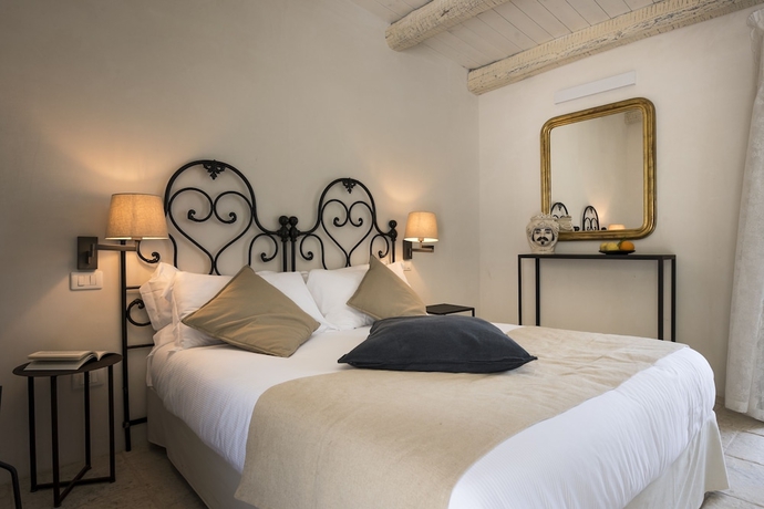 Imagen de la habitación del Baglio Siciliamo Country House. Foto 2