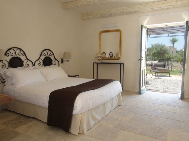 Imagen de la habitación del Baglio Siciliamo Country House. Foto 3