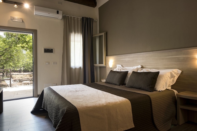 Imagen de la habitación del Baglio Siciliamo Country House. Foto 6
