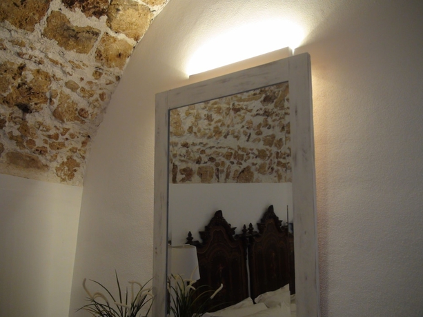 Imagen de la habitación del Baglio Siciliamo Country House. Foto 9