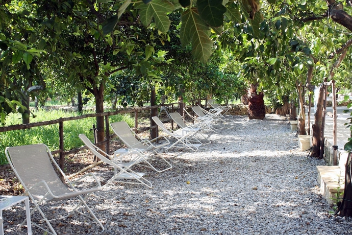 Imagen de la habitación del Baglio Siciliamo Country House. Foto 12
