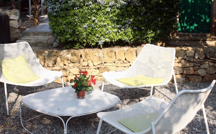 Imagen de la habitación del Baglio Siciliamo Country House. Foto 13