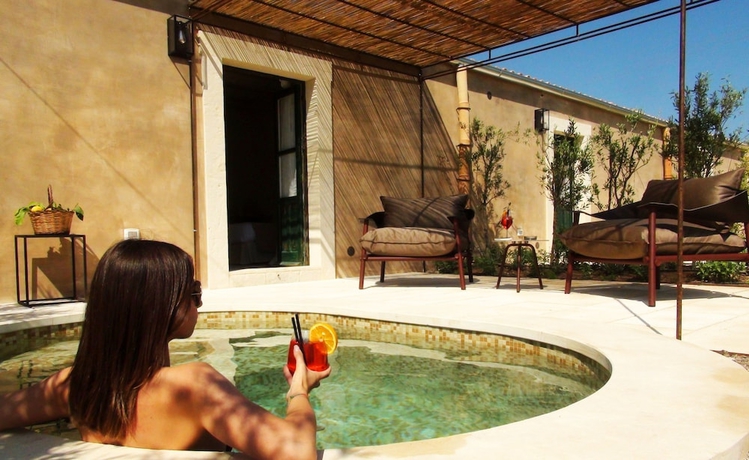 Imagen de la habitación del Baglio Siciliamo Country House. Foto 14