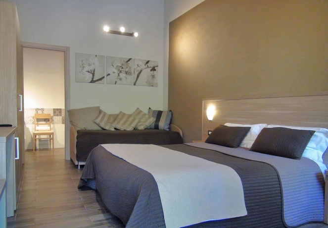 Imagen de la habitación del Baglio Siciliamo Country House. Foto 16