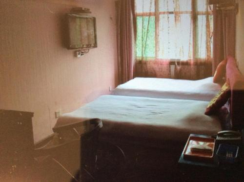 Imagen de la habitación del Baifu Hotel. Foto 5