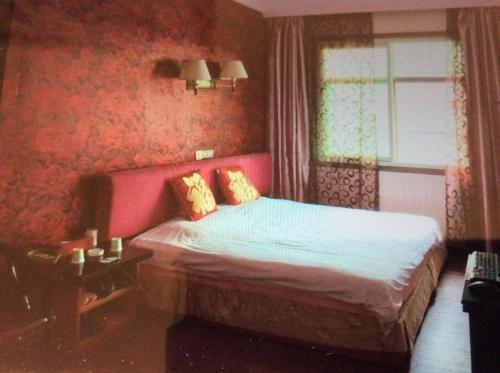 Imagen de la habitación del Baifu Hotel. Foto 6