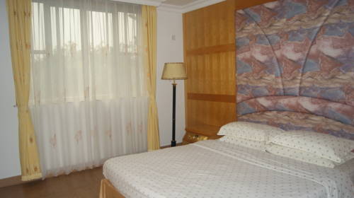 Imagen de la habitación del Baiyun Airport Hot Spring Resort. Foto 1
