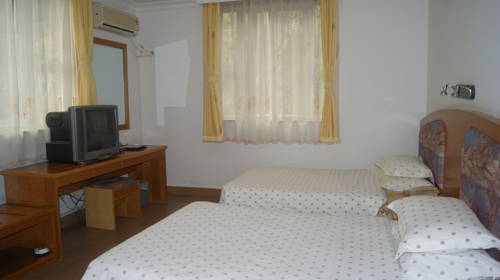 Imagen de la habitación del Baiyun Airport Hot Spring Resort. Foto 3