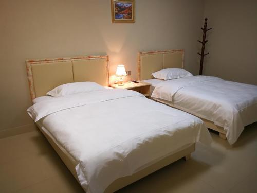 Imagen de la habitación del Bajie Youth Hotesl (tianmenshang Train Station). Foto 5