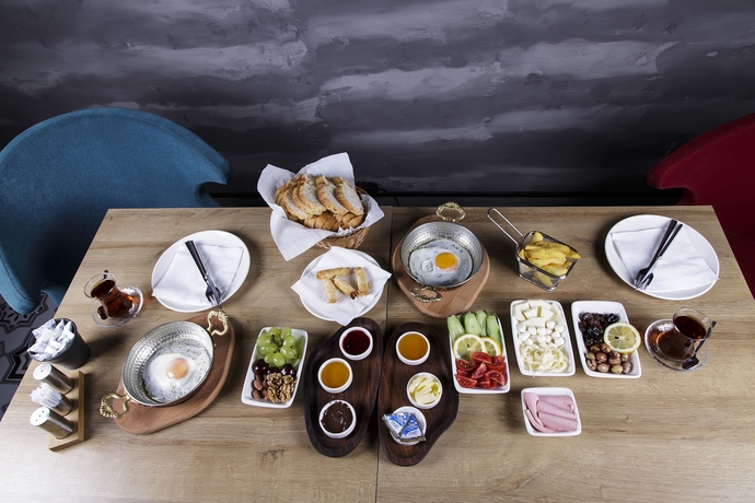 Imagen del bar/restaurante del Bakırk&ouml;y Des Suit Otel. Foto 2