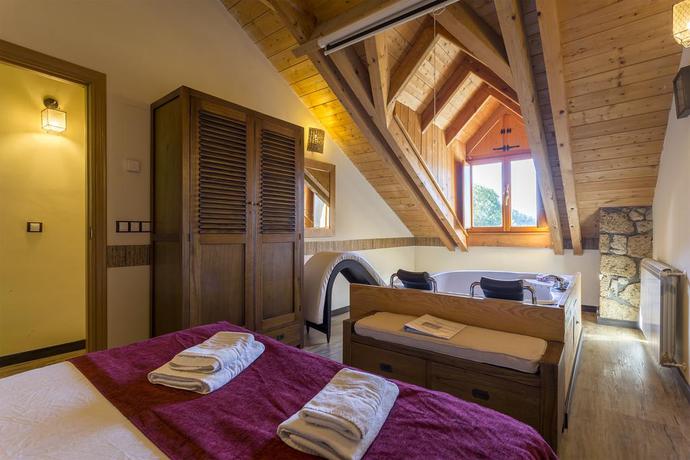 Imagen de la habitación del Balcon del Pirineo Rural Ordesa. Foto 3