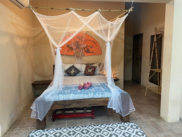 Imagen de la habitación del Bali Suites Itamambuca. Foto 5
