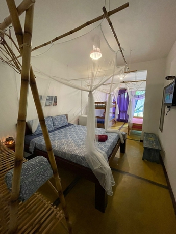 Imagen de la habitación del Bali Suites Itamambuca. Foto 10