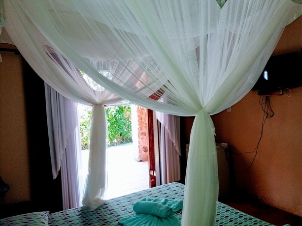 Imagen de la habitación del Bali Suites Itamambuca. Foto 12