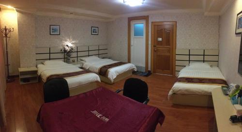 Imagen de la habitación del Baohe Guesthouse. Foto 6