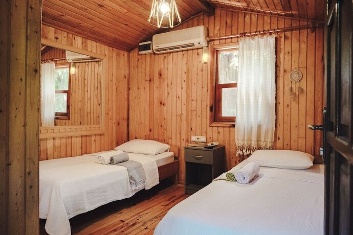 Imagen de la habitación del Base Bungalows. Foto 19