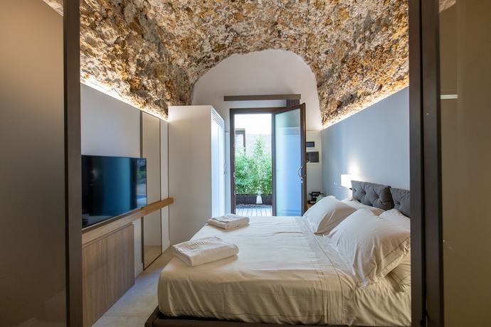 Imagen de la habitación del Bastione Spasimo Boutique Hotel. Foto 2