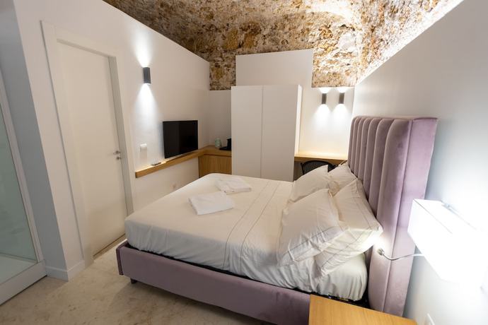 Imagen de la habitación del Bastione Spasimo Boutique Hotel. Foto 8