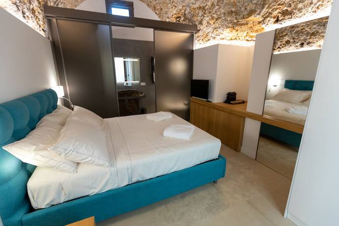 Imagen de la habitación del Bastione Spasimo Boutique Hotel. Foto 9