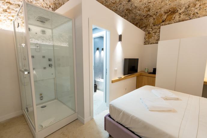 Imagen de la habitación del Bastione Spasimo Boutique Hotel. Foto 10