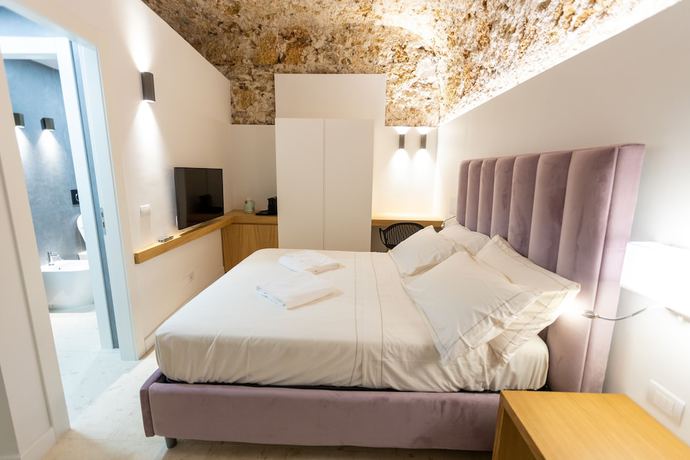 Imagen de la habitación del Bastione Spasimo Boutique Hotel. Foto 11
