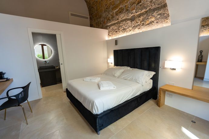 Imagen de la habitación del Bastione Spasimo Boutique Hotel. Foto 13