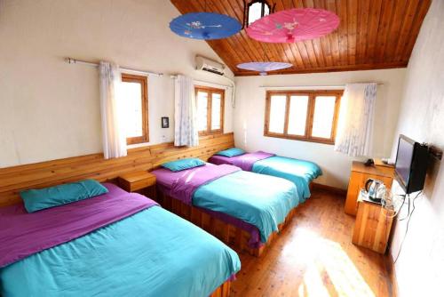 Imagen de la habitación del Bathe Under Moon Light Homestay. Foto 5