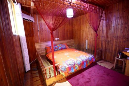 Imagen de la habitación del Bathe Under Moon Light Homestay. Foto 6