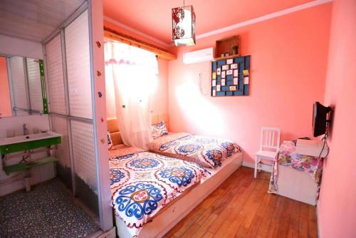 Imagen de la habitación del Bathe Under Moon Light Homestay. Foto 7