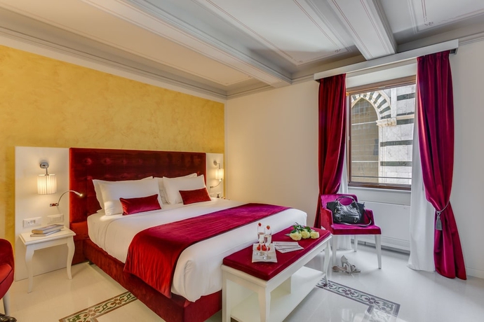 Imagen de la habitación del Battistero Residenza D'epoca. Foto 16