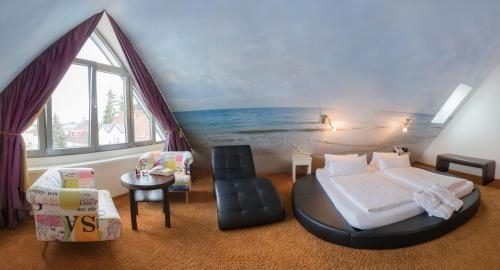 Imagen de la habitación del Bavaria Lifestyle Hotel. Foto 10