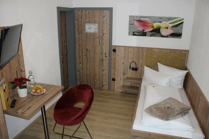 Imagen de la habitación del Bayerische Gastwirtschaft Dimpfl-Stadl. Foto 19