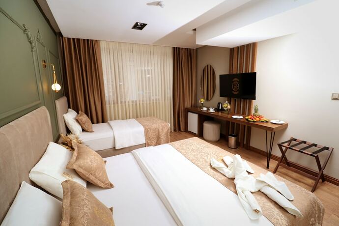 Imagen de la habitación del Bayrak Grand Hotel. Foto 10