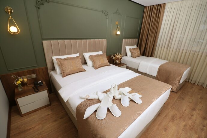 Imagen de la habitación del Bayrak Grand Hotel. Foto 14