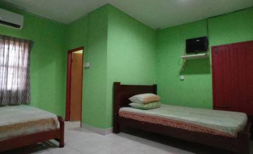 Imagen de la habitación del Bayu Beach Chalet PCB. Foto 20