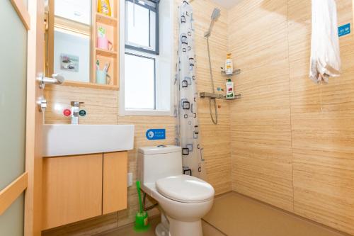 Imagen de la habitación del Bayuquan Wanke Wanghaige Sea View Apartment. Foto 6