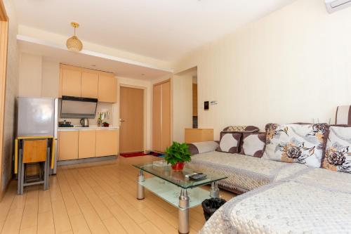 Imagen de la habitación del Bayuquan Wanke Wanghaige Sea View Apartment. Foto 8