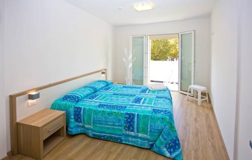 Imagen de la habitación del Beach Residence. Foto 1