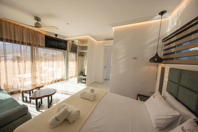 Imagen de la habitación del Beach Walk Luxury Suites. Foto 14